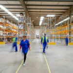 workers walking in warehouse